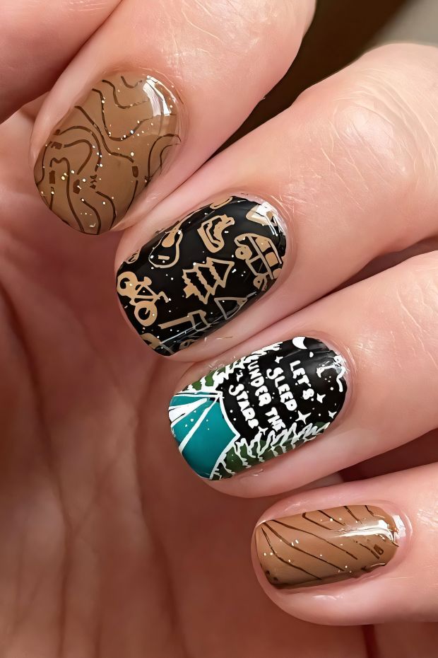 Camping themed nail art with trees, tents, and earthy colors for outdoor enthusiasts and nature lovers.