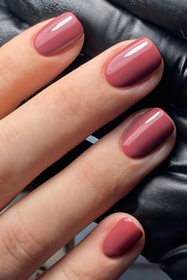 Stylish burgundy nude gradient nail design featuring smooth and glossy finishes perfect for elegant aesthetics.