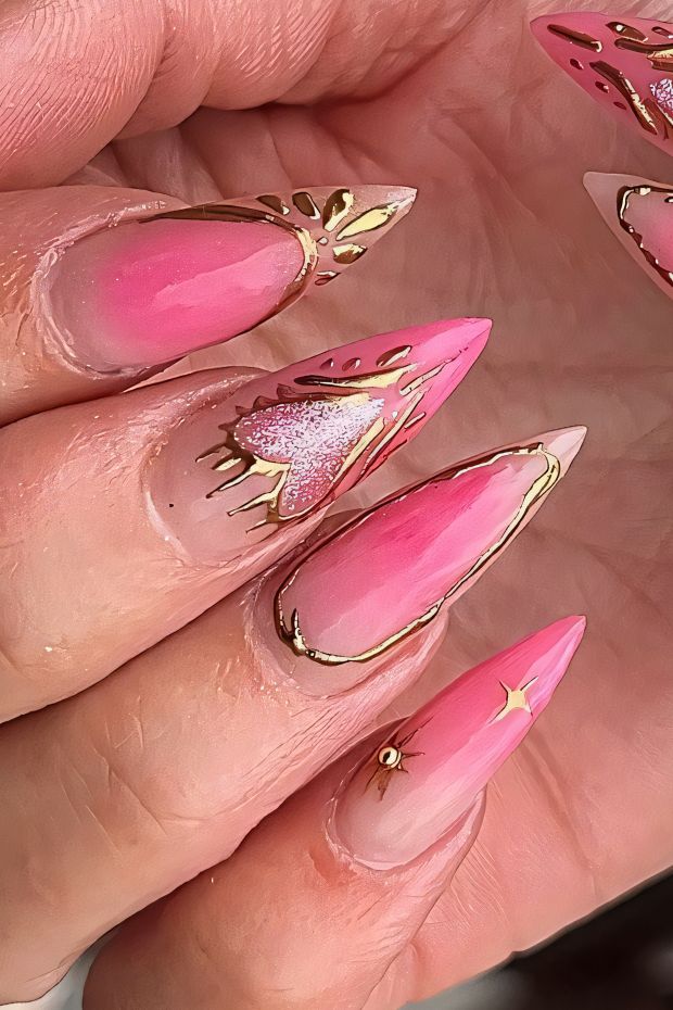 Chic birthday nails featuring pink hues, glitter, and gold accents designed for a festive celebration.