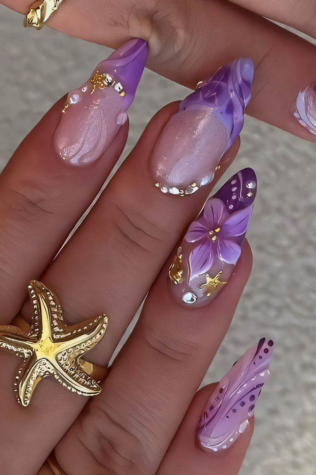 Glamorous purple floral birthday nails with intricate designs and golden accents, perfect for a celebration.