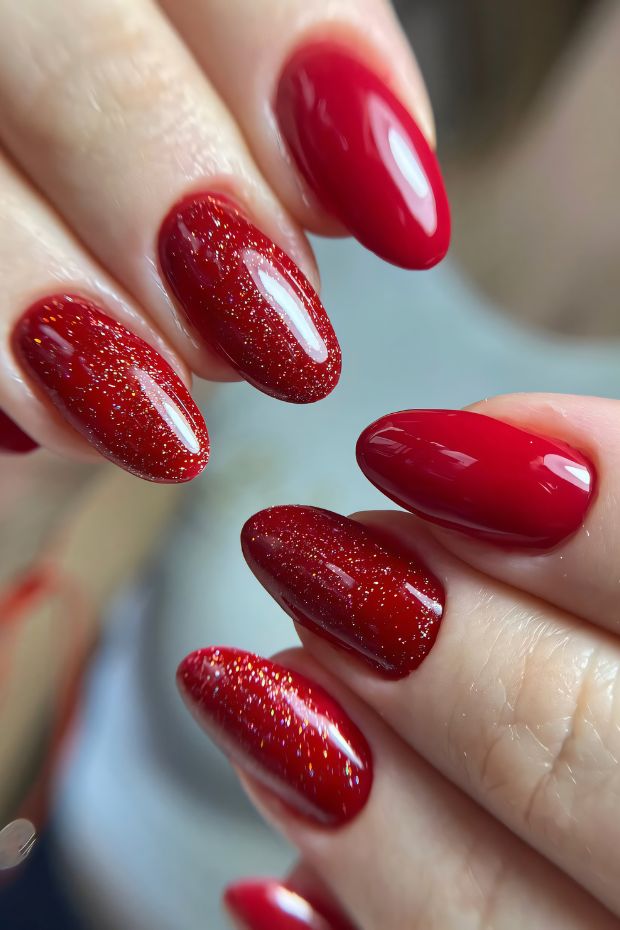 Glamorous red nails featuring glossy and glitter finishes, perfect for bold fashion statements and stylish looks.