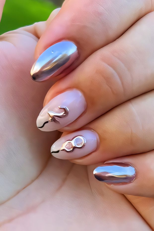 Elegant birthday nails with metallic accents, nude base, and stylish embellishments for a festive celebration.