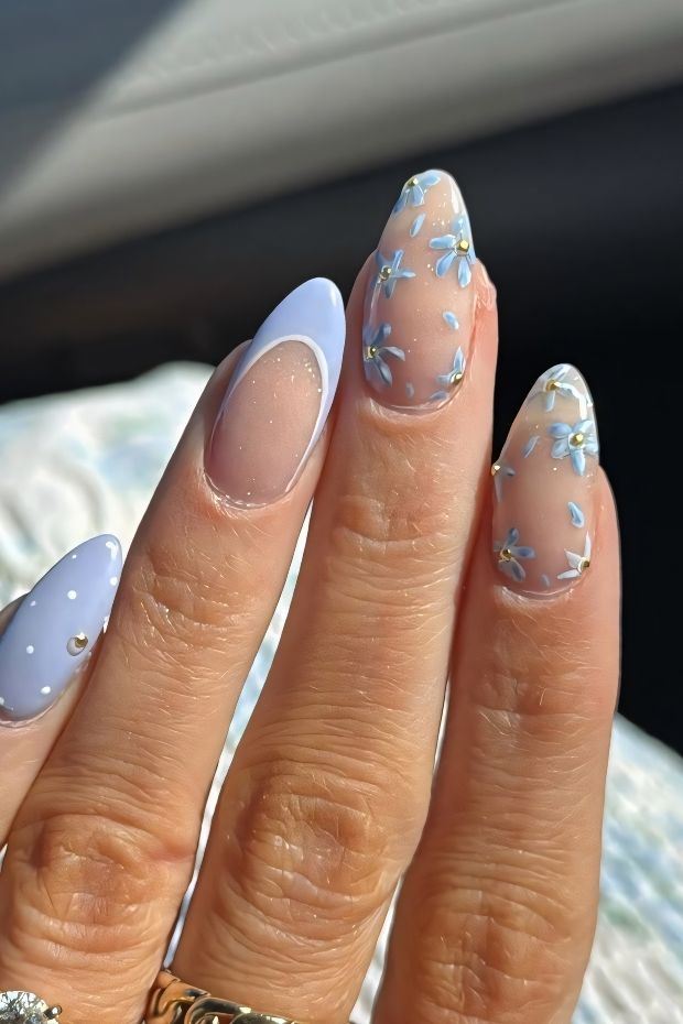 32 Creative Acrylic Nail Ideas You’ll Want to Try This Season 7 Acrylic nails in pastel blue with floral designs and ombre effects, showcasing elegant and stylish nail art.