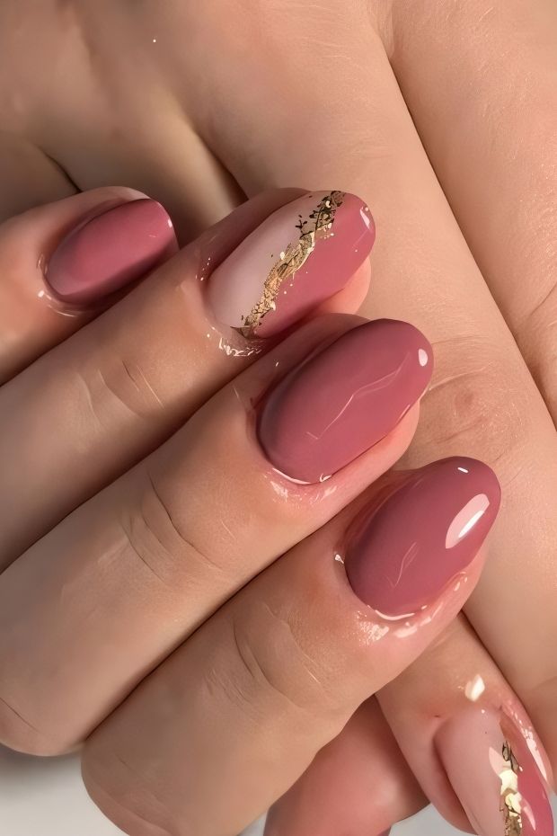 32 Creative Acrylic Nail Ideas You’ll Want to Try This Season 5 Pink acrylic nails with gold accents and glossy finish, showcasing elegant and stylish nail design ideas.