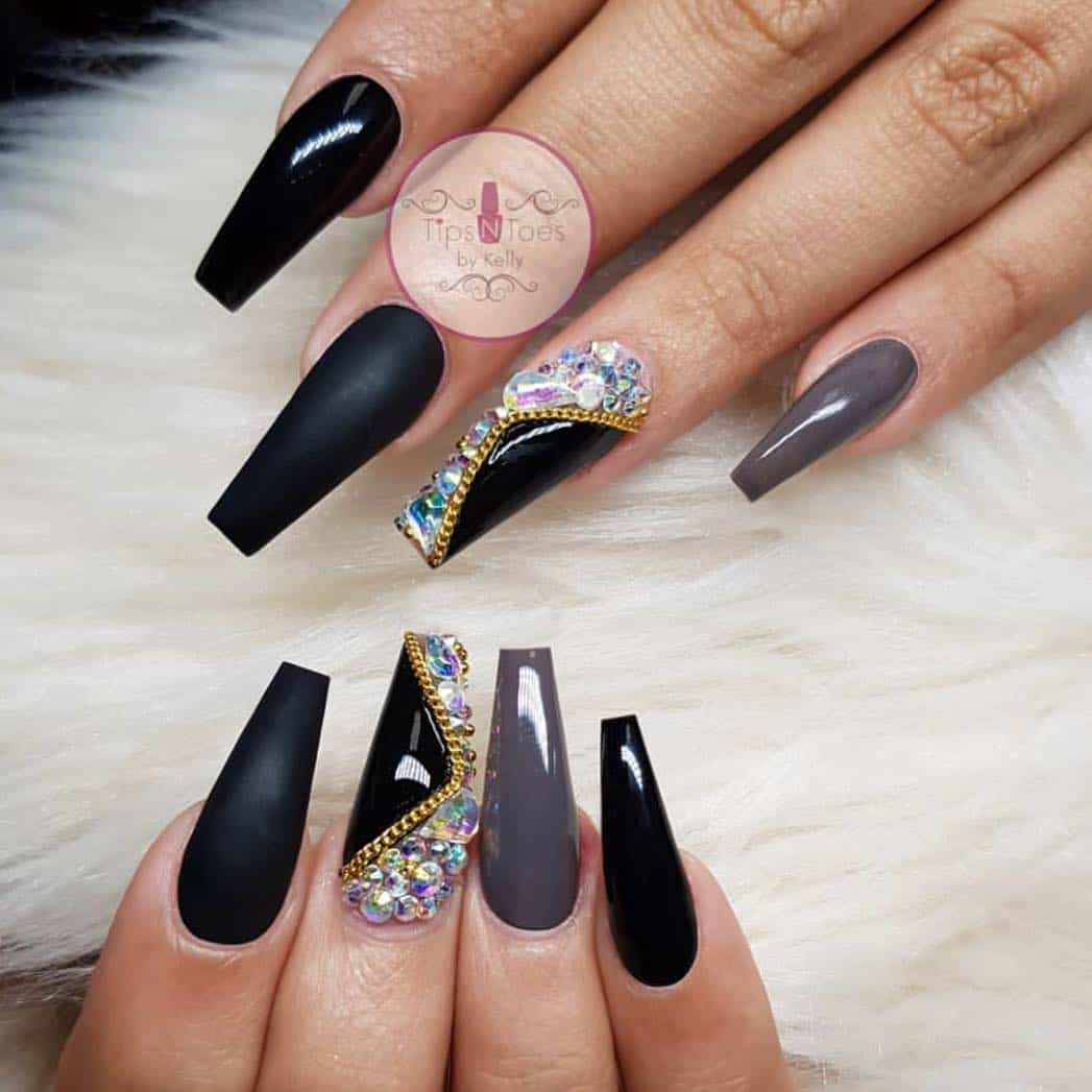 These creative designs for black acrylic nails are perfect for those who want something fun, simple, and classic. With so many beautiful nail artists out there these days, it can be hard to decide which style to go with. If you're looking for a design that will work well with any outfit or occasion, then look no further than this post! #blacknails #blacknailart #blacknaildesigns #blackacrylicnails