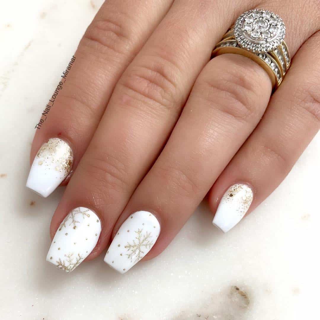 With 32 new, cool and trendy white acrylic nail designs, it's hard to pick just one! You'll be able to find the perfect design for any occasion with these new designs. Check out all of them now on Polish and Pearls! #whitenails #whitenaildesigns #whitenailart