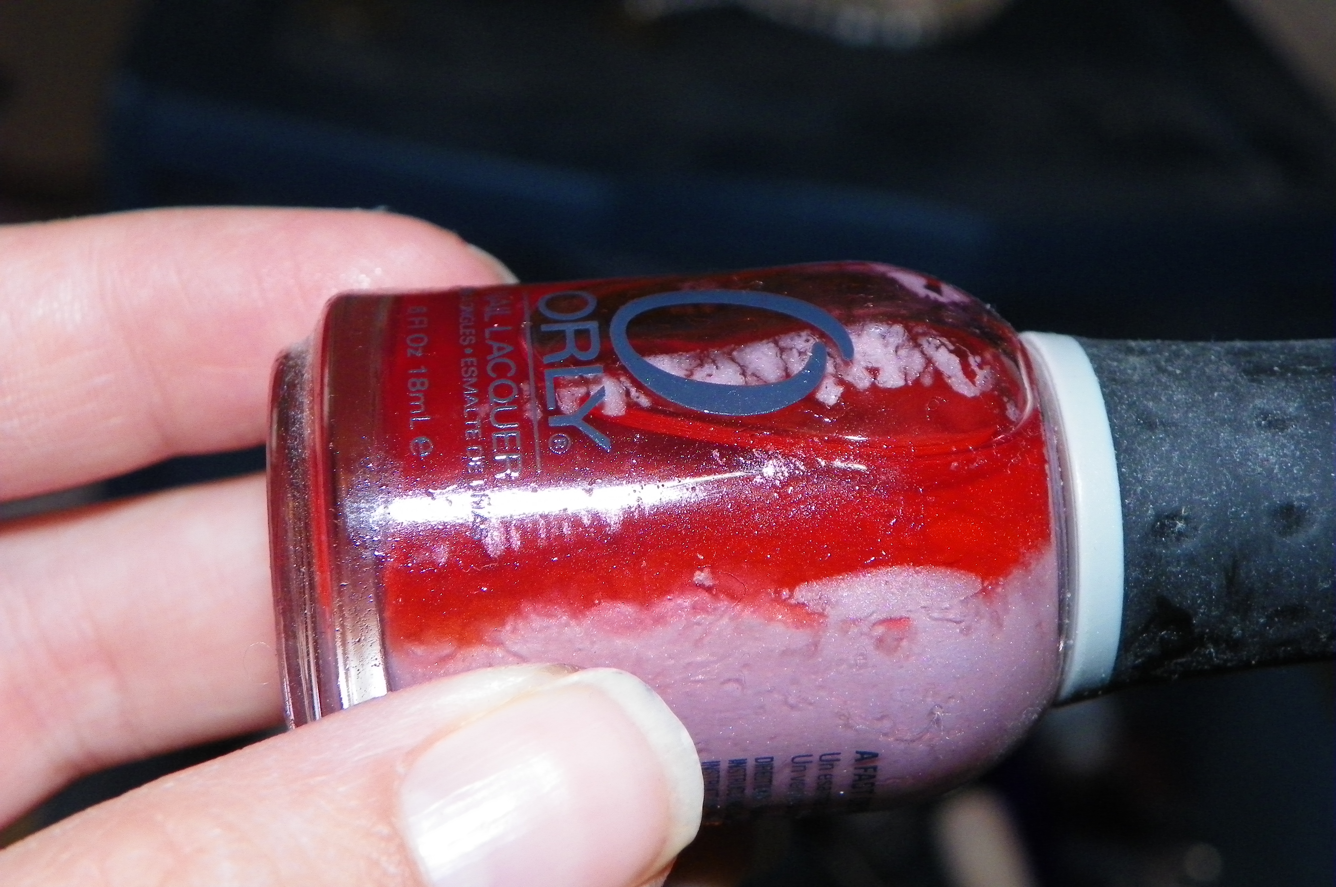 Discoloration in expired nail polish. 